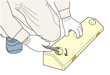 アンカーキャップを手で押し込んで取り付けているイラスト